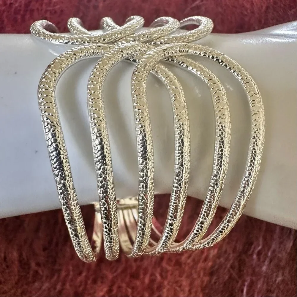 Silver tone textured hinged wide bracelet